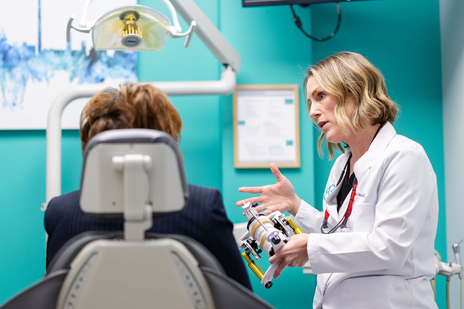Dr. Hulver explaining a treatment plan to a patient