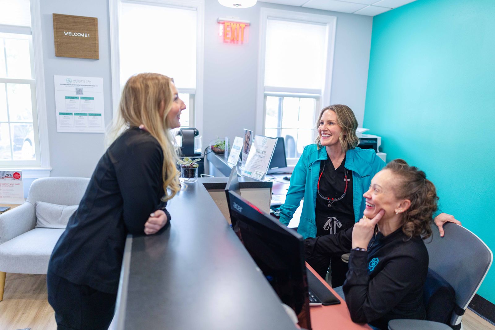 Front desk team at Metropolitan Dental Centre in Fairfax
